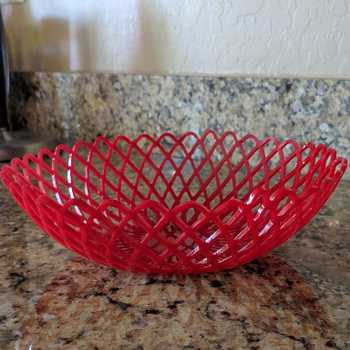 Lace bowl heat formed in oven on metal bowl